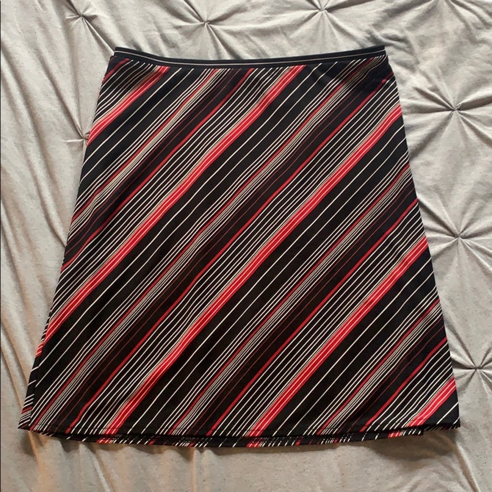 Red white and black diagonal striped skirt